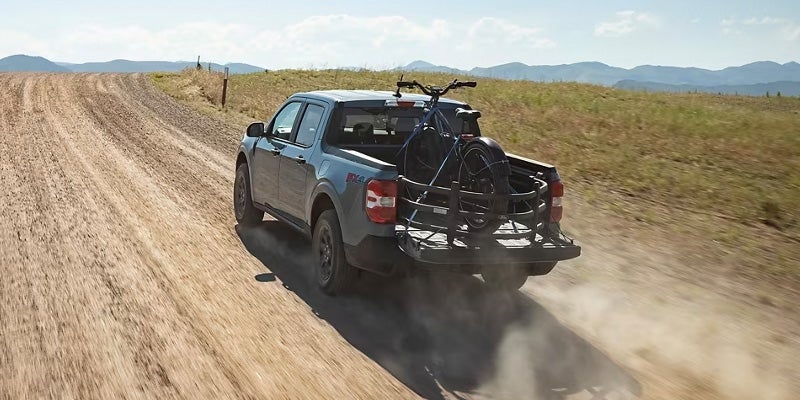 2024 Ford Maverick driving on dirt road